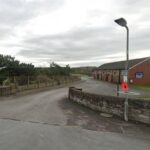 Dog training firm wants larger building to replace damaged storage building